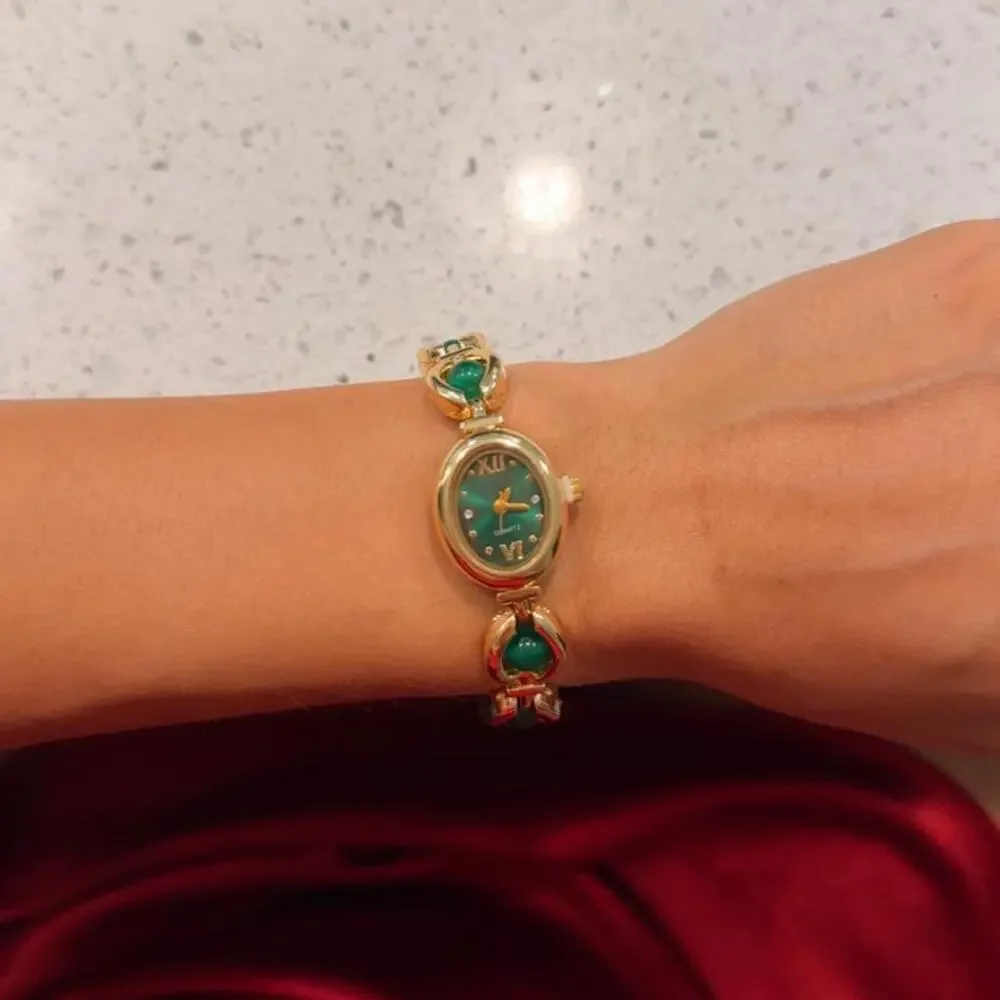 Gold and green vintage watch